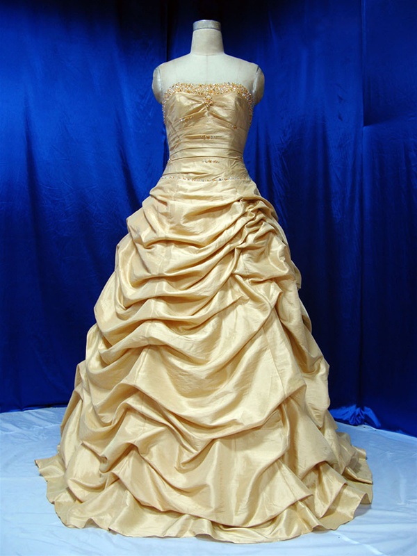 Displayed here is an amazing Gold Taffeta Wedding Dress from one of the top 